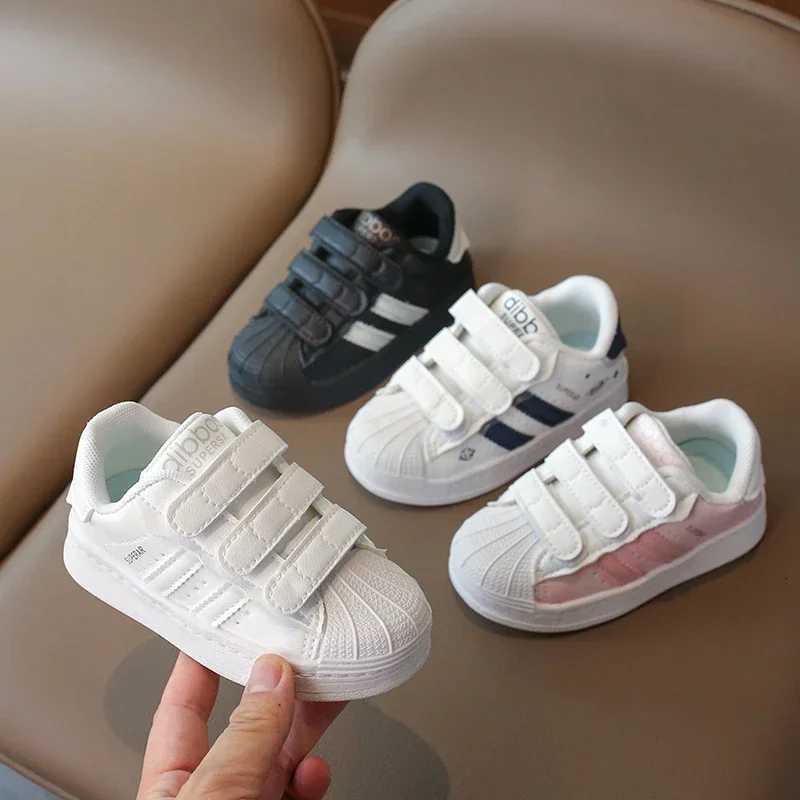 These Kids' Shell-toe Sneakers are stain-resistant, easy to clean, and perfect for active toddlers in spring, making them ideal for both play and