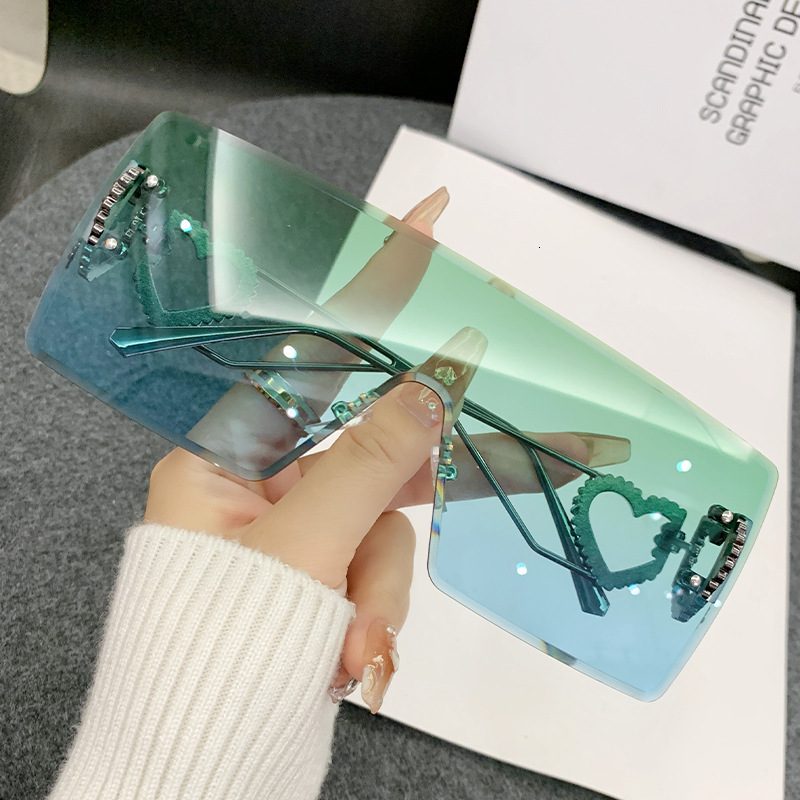 2026 New Designer Brand One-piece Heart-shaped Frameless Sunglasses Europe And America Y2K Internet Celebrity Style Fashion Sunglasses Cross-border