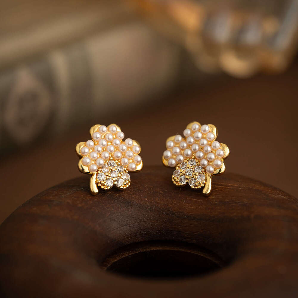 New Four-leaf Clover Micro-inlaid Pearl Earrings, Exquisite And Compact Studs With A High-end, Fashionable, Light-luxury Design