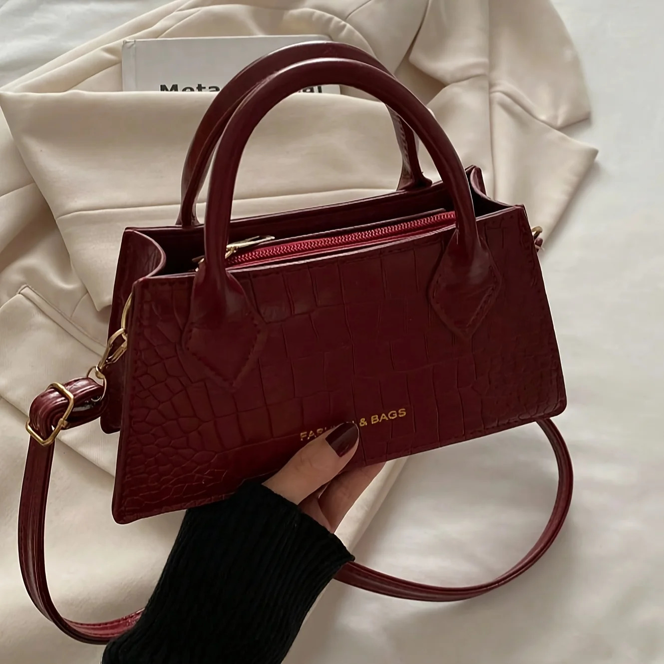 Burgundy Red Elegant Small Bag Adjustable Shoulder Strap and Zipper Closure Suitable for Travel and Daily Use 260302