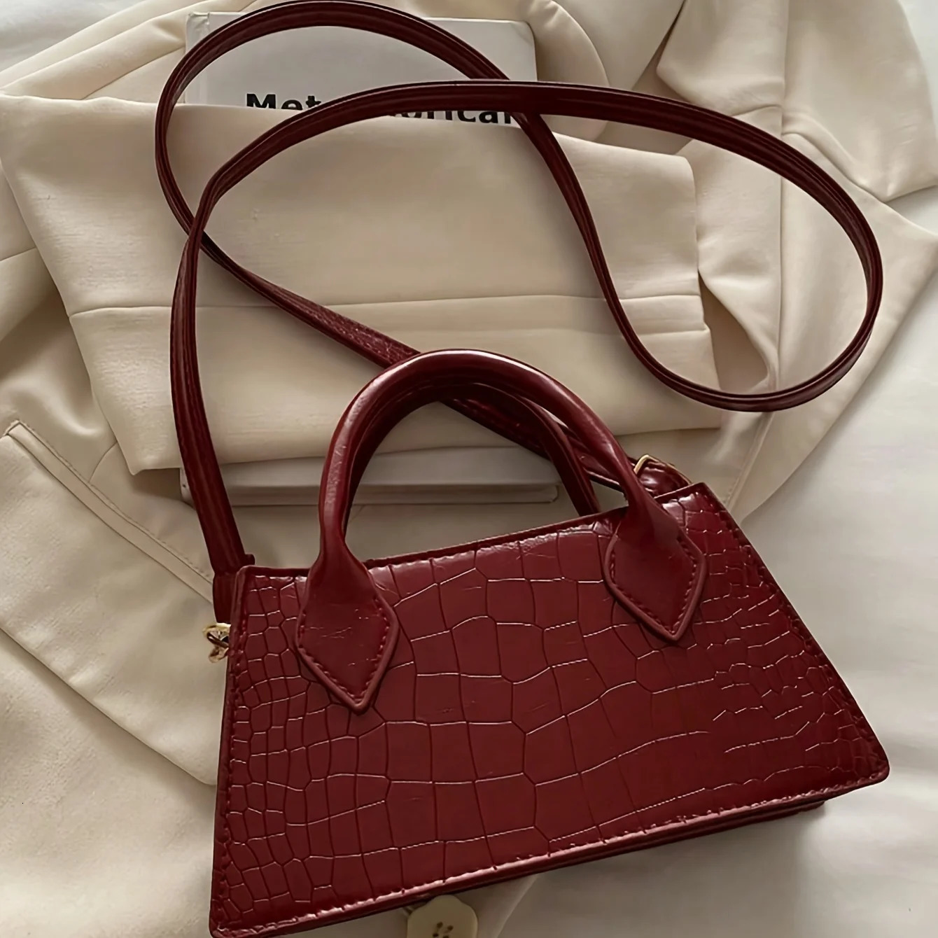 Burgundy Red Elegant Small Bag Adjustable Shoulder Strap and Zipper Closure Suitable for Travel and Daily Use 260302