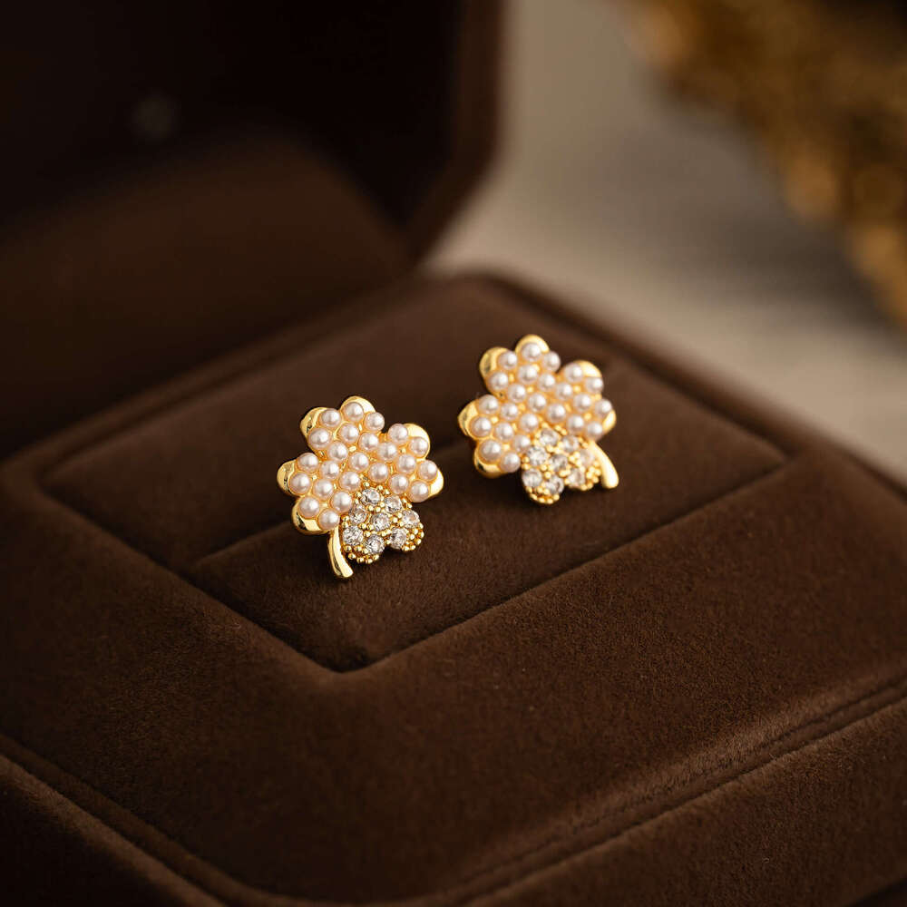 New Four-leaf Clover Micro-inlaid Pearl Earrings, Exquisite And Compact Studs With A High-end, Fashionable, Light-luxury Design