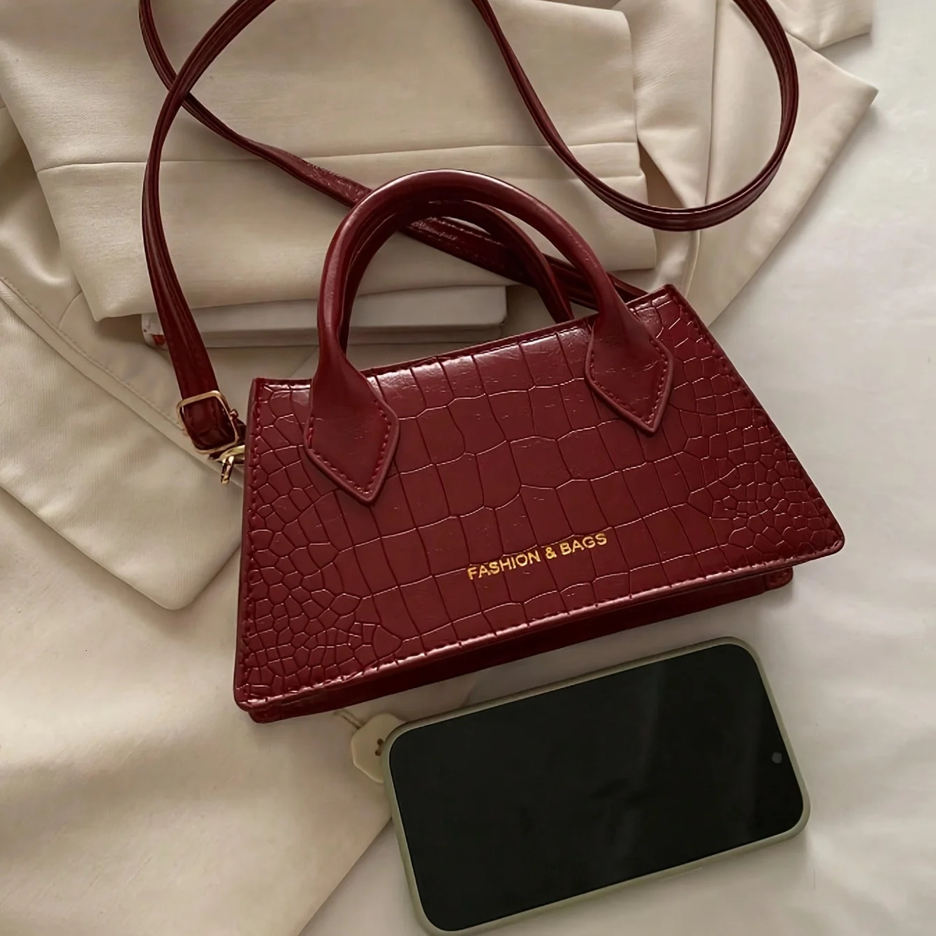 Burgundy Red Elegant Small Bag Adjustable Shoulder Strap and Zipper Closure Suitable for Travel and Daily Use 260302