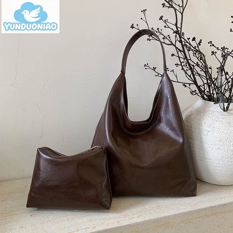 YUNDUONIAO new women's large capacity commuting bag, simple and fashionable retro handbag, casual and lazy personality crossbody bag