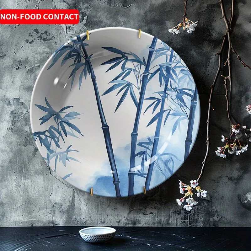 This ink-wash blue and white decorative plate with bamboo motifs brings serenity and elegance to your home decor.T260304