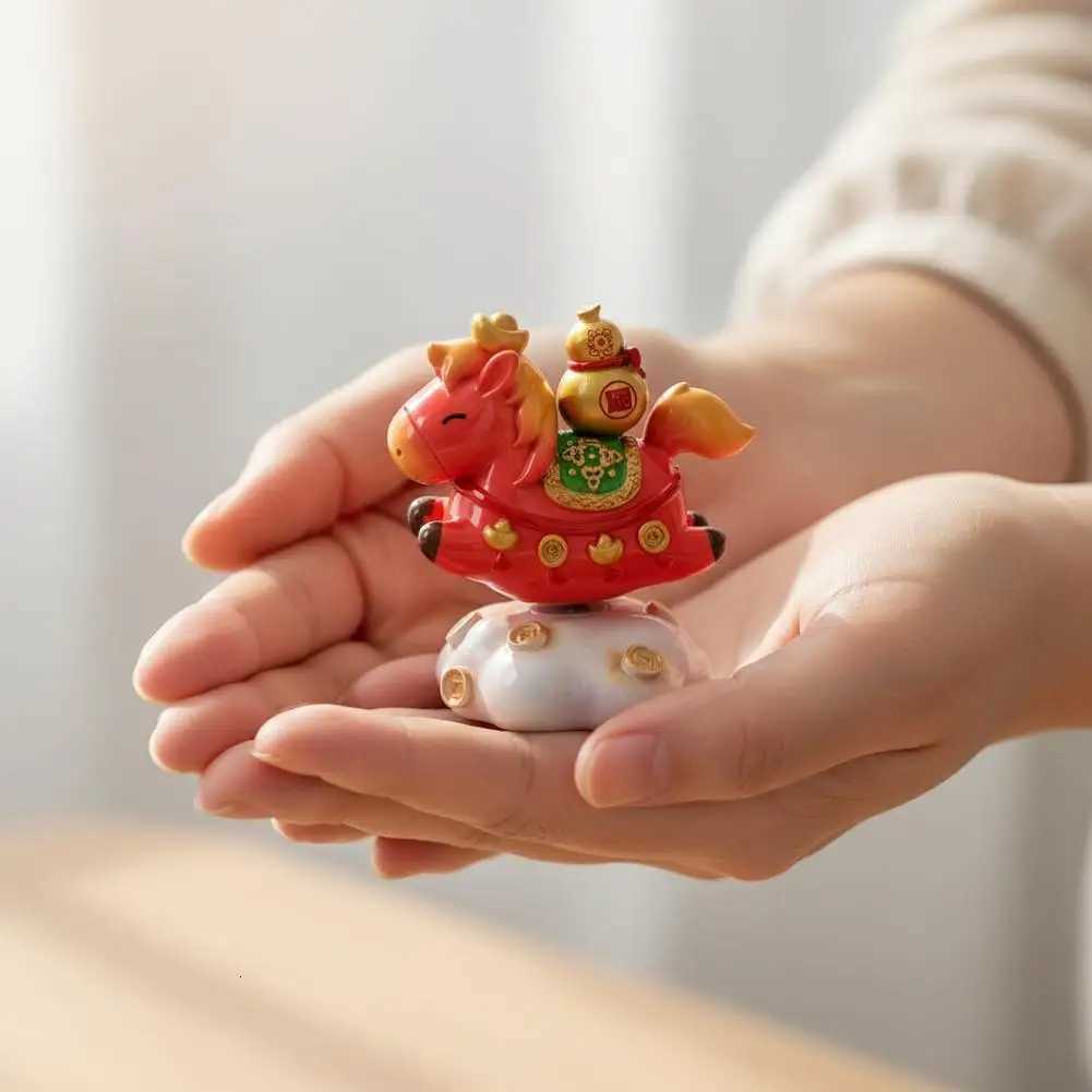This 2026 Year of the Horse resin statue brings festive feng shui charm to your tabletop decor.T260304