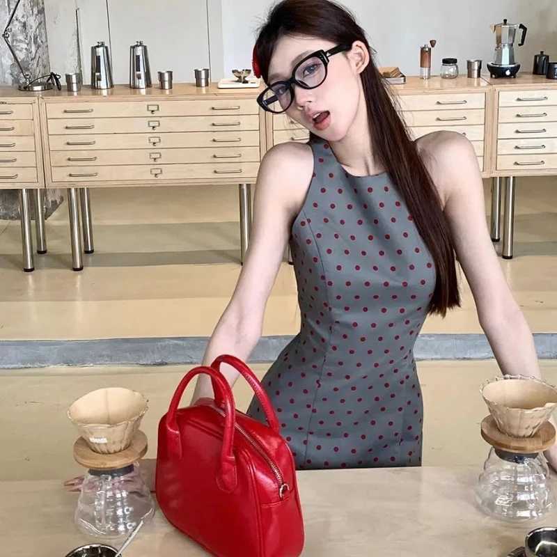 French Polka Dot Sleeveless Hip-paCK Dress for Women Summer New RETRO Temperament Slim Hot VEST Short Skirt M260304