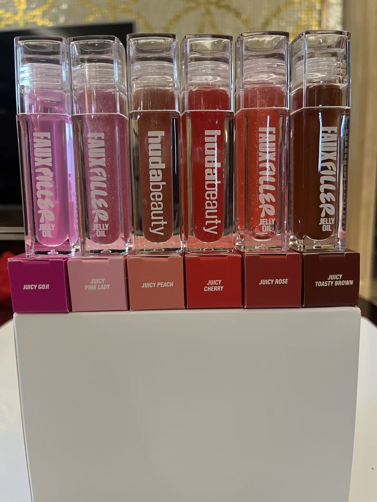 hudabeauty FAUX FILLER EXTRA SHINE Shine Filler LIP GLOSS Liquid Eyeliner Makeup Lip Oil Moisturizing Temperature Liquid Lipstick Lifter Gloss Hydrati