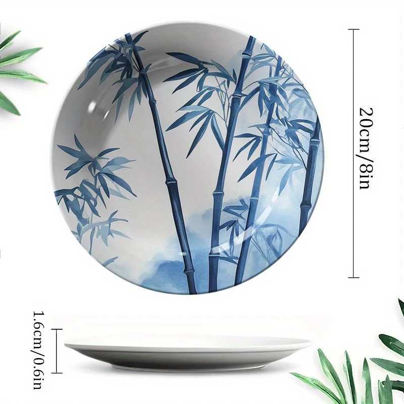 This ink-wash blue and white decorative plate with bamboo motifs brings serenity and elegance to your home decor.T260304