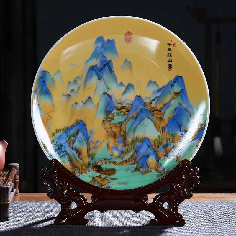 This Jingdezhen ceramic plate replicates the A Thousand Li of Rivers and Mountains painting, adding artistic grandeur to your home decor.T260304