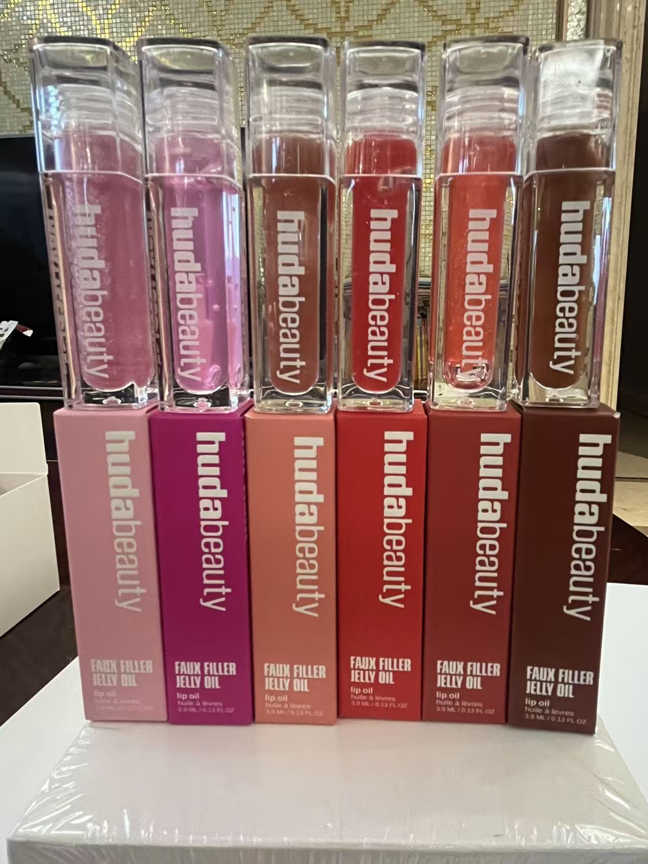 hudabeauty FAUX FILLER EXTRA SHINE Shine Filler LIP GLOSS Liquid Eyeliner Makeup Lip Oil Moisturizing Temperature Liquid Lipstick Lifter Gloss Hydrati