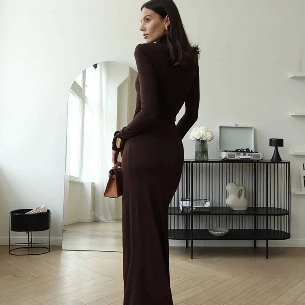 European and American autumn and winter fashionable sexy high slit tied waist long skirt new spicy high neCK slim fit dress M260304
