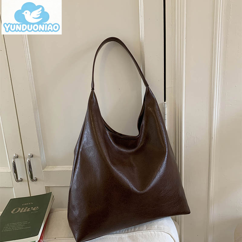YUNDUONIAO new women's large capacity commuting bag, simple and fashionable retro handbag, casual and lazy personality crossbody bag