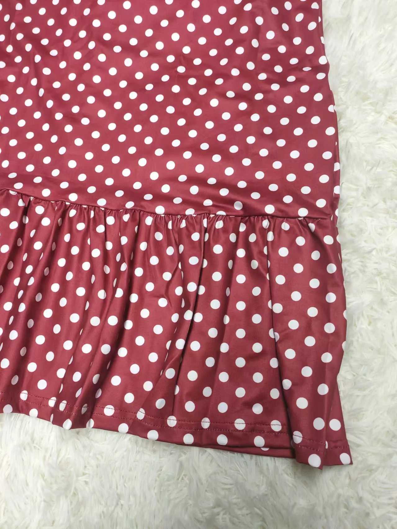 The chic sleeveless dress for spring and summer 2025 features an elegant black and white polka dot print pattern a fashionable M260304