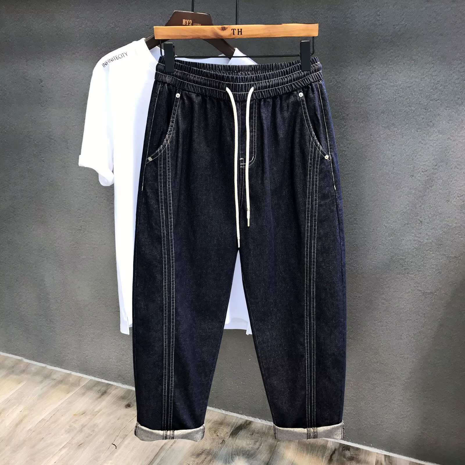 Designer Pants New Spring Washed Denim Jeans With Visible Stitching Wear-resistant Drawstring Design Loose Fit Men's Fashionable Versatile Casual Trousers