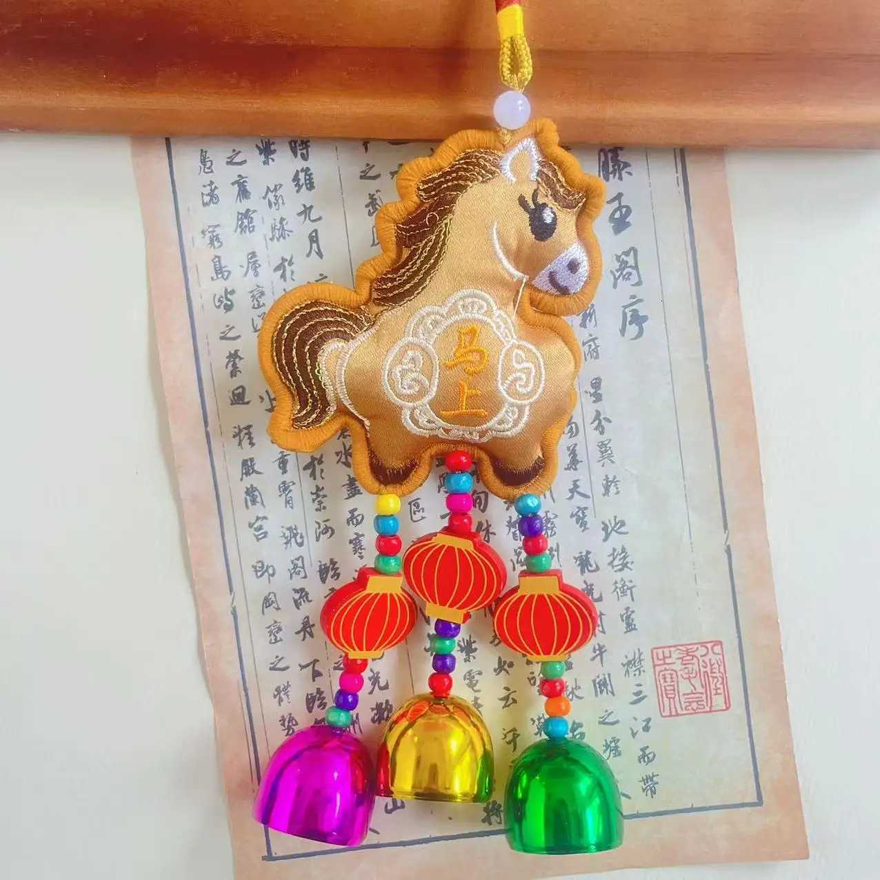 This 2026 Year of the Horse embroidered hanging ornament with tassels brings blessings of immediate success to your home and car.T260304