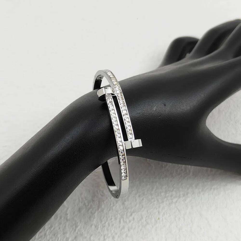 Cheap double headed nail stainless steel gold-plated women's zircon bangle, Thanksgiving, Christmas, and New Year gifts XJ260303