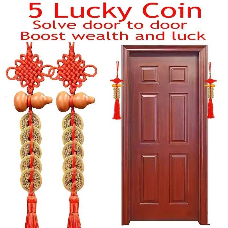 This antique brass Five Emperors Coins pendant with a red tassel symbolizes wealth and protection for your living space.T260304