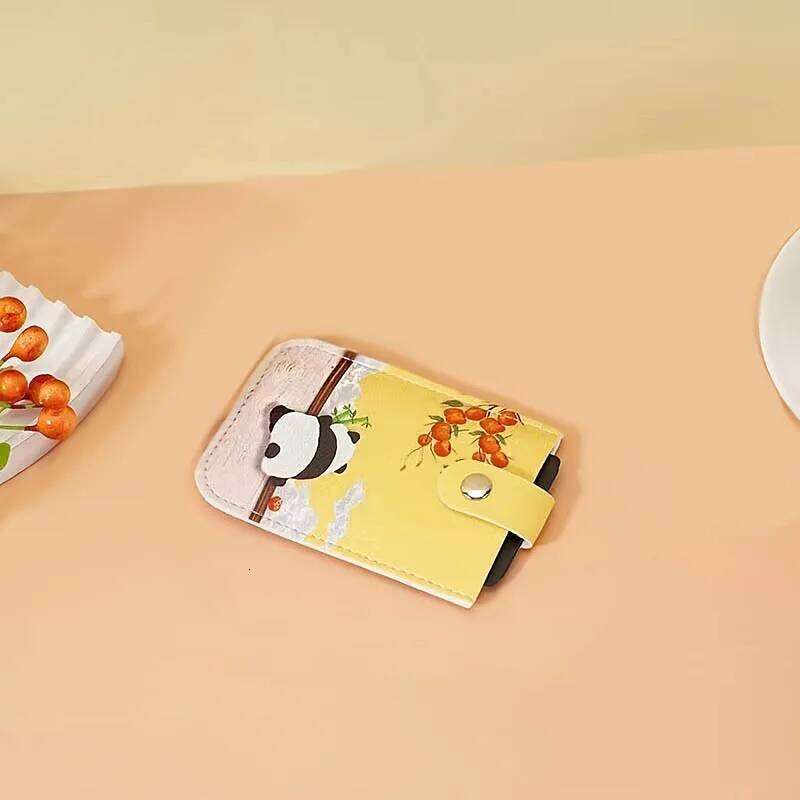 A slim portable credit wallet with RFID shielding, multiple card slots, cute panda design, compact and lightweight C260304