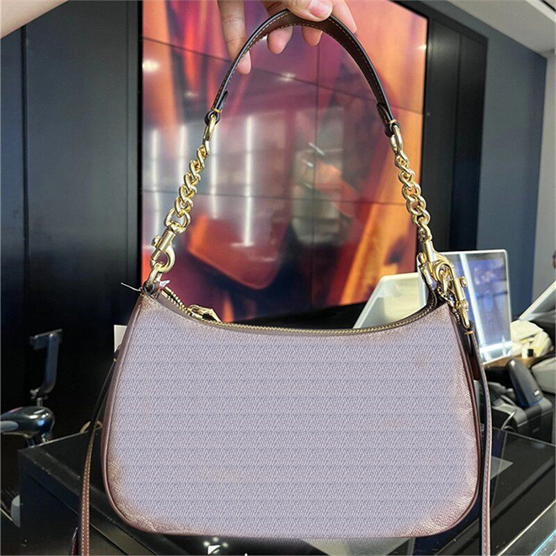 Versatile Female Accessory: Stylish Crescent Monogram Patterned Cross Body Pouch w/Swappable Straps 70155565