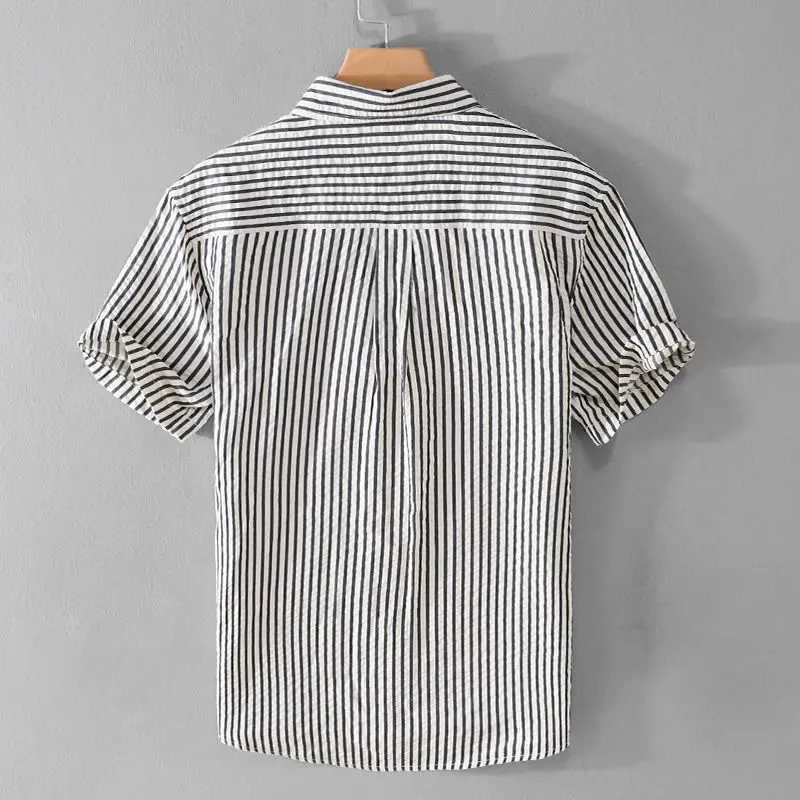 Summer Striped Double Pocket Short-sleeved Mens Chic Shirt Loose Bubble Texture Simple and Versatile Young Retro Mens Shirt M260305
