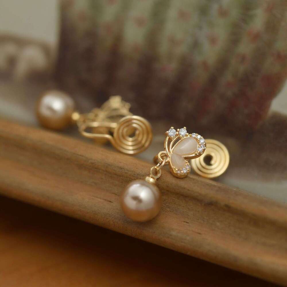 Champagne High-end Pearl Cat's Eye Stone Butterfly Earrings for Women Versatile Accessories Mosquito Coil Ear Clips
