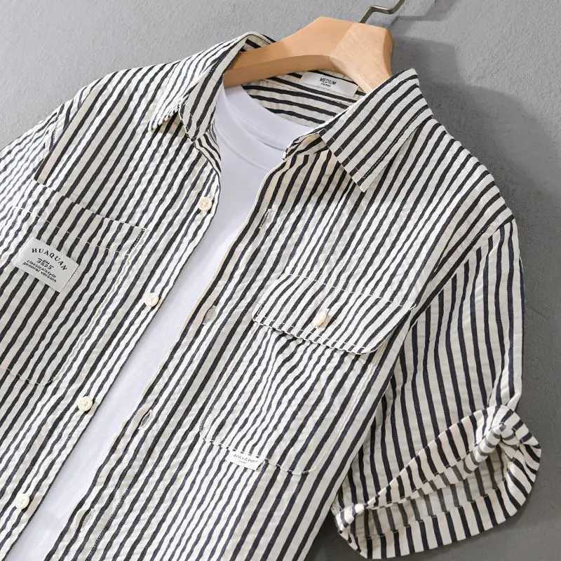Summer Striped Double Pocket Short-sleeved Mens Chic Shirt Loose Bubble Texture Simple and Versatile Young Retro Mens Shirt M260305