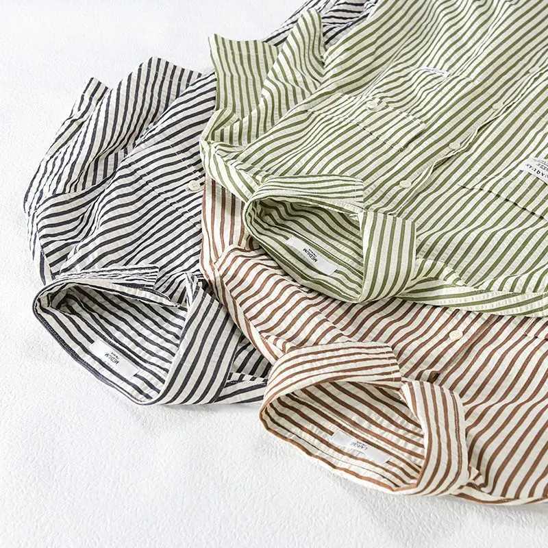 Summer Striped Double Pocket Short-sleeved Mens Chic Shirt Loose Bubble Texture Simple and Versatile Young Retro Mens Shirt M260305