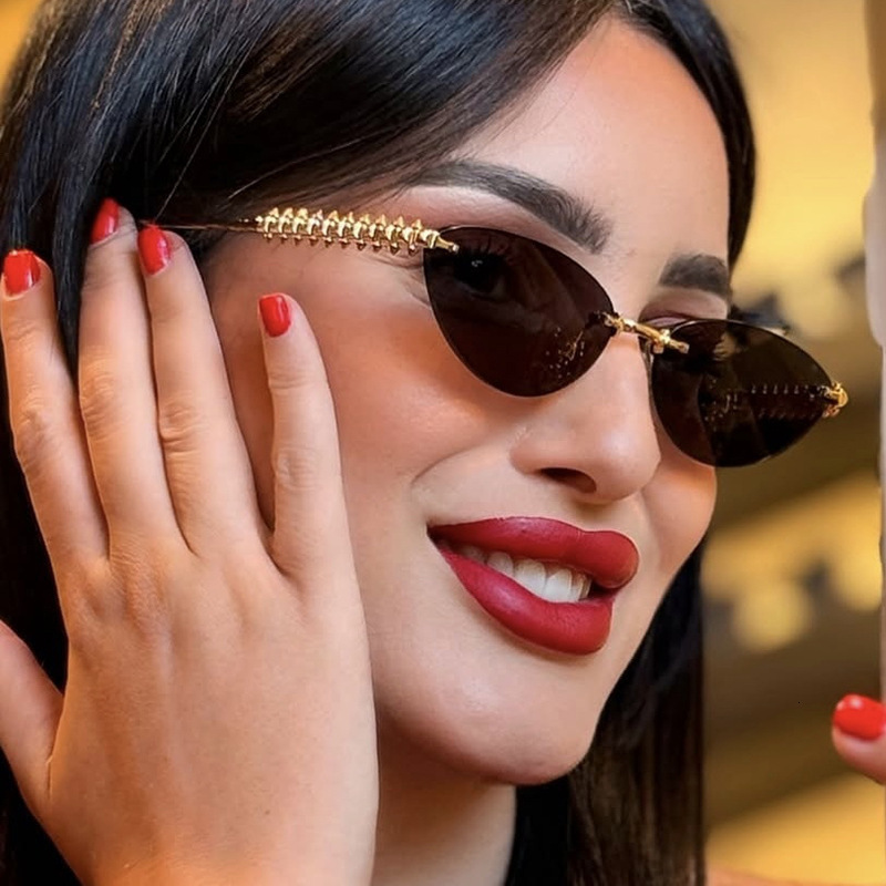2026 New Designer Luxury Brand Nail Triangle Cat Eye Sunglasses Frameless Cutting Edge European And American Fashion High-end Sunglasses Sunshade Sung