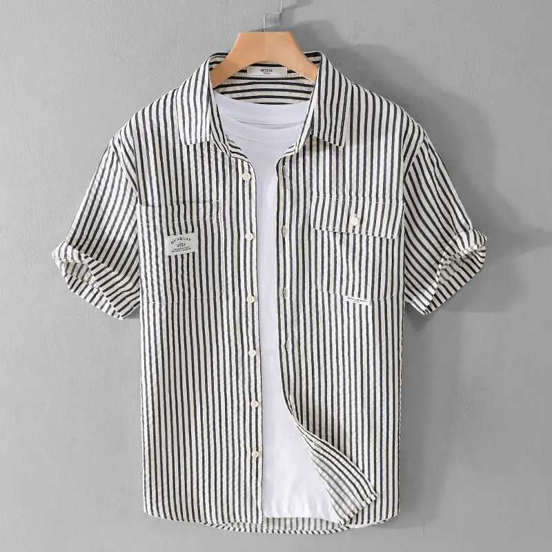 Summer Striped Double Pocket Short-sleeved Mens Chic Shirt Loose Bubble Texture Simple and Versatile Young Retro Mens Shirt M260305