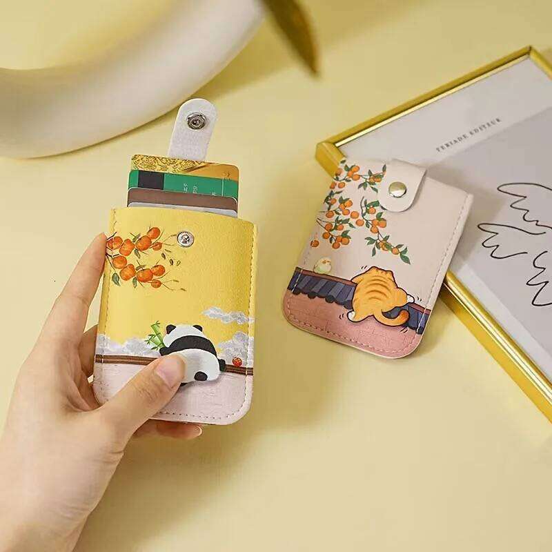A slim portable credit wallet with RFID shielding, multiple card slots, cute panda design, compact and lightweight C260304