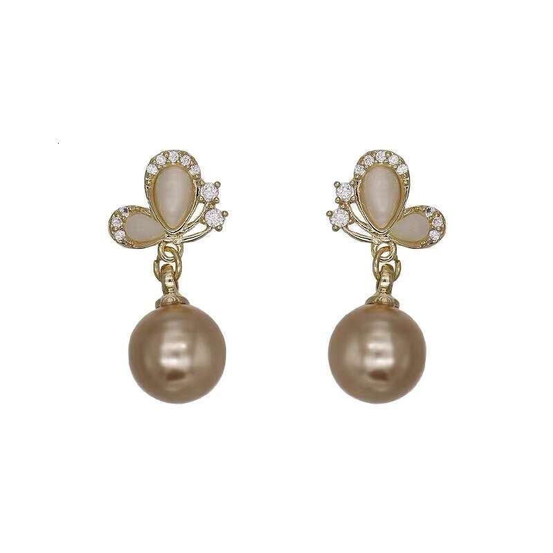 Champagne High-end Pearl Cat's Eye Stone Butterfly Earrings for Women Versatile Accessories Mosquito Coil Ear Clips