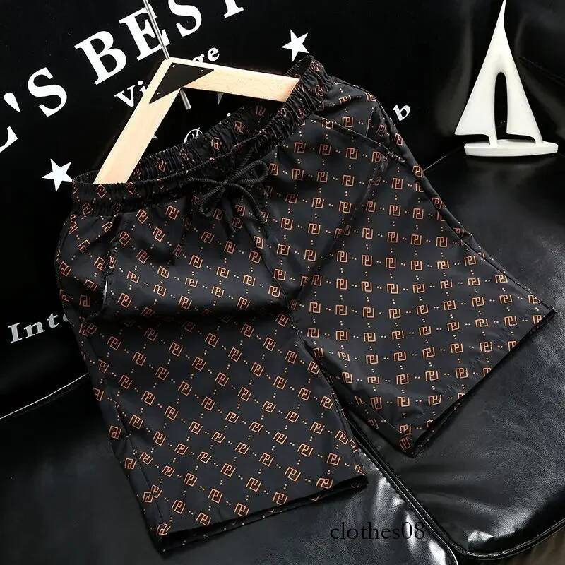 Ice silk thin shorts for men to wear in the summer of 2024 new men's beach pants
