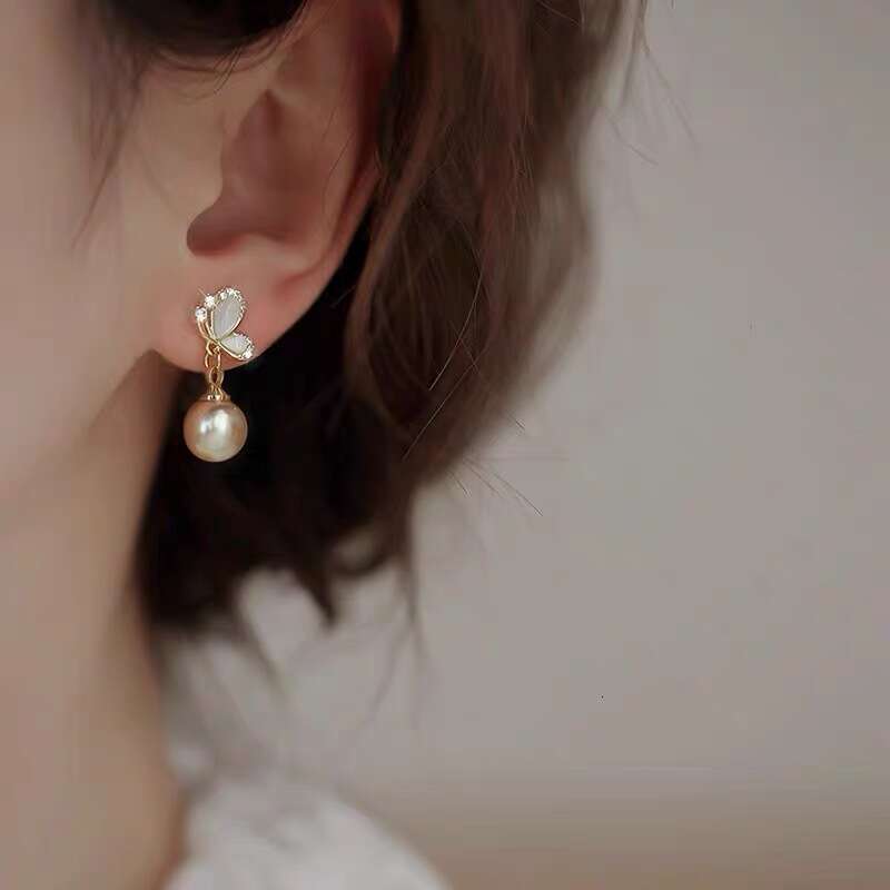 Champagne High-end Pearl Cat's Eye Stone Butterfly Earrings for Women Versatile Accessories Mosquito Coil Ear Clips
