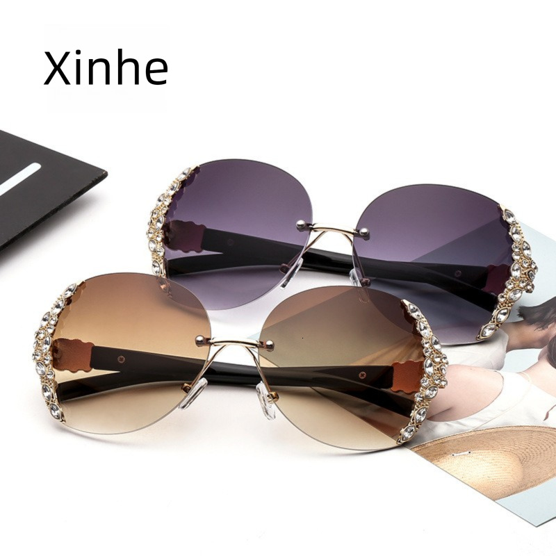 2026 New Designer Luxury Brand Fashion European And American Diamond Inlaid Elegant Fashion Sunglasses Metal Frameless Pointed Sunglasses Women's