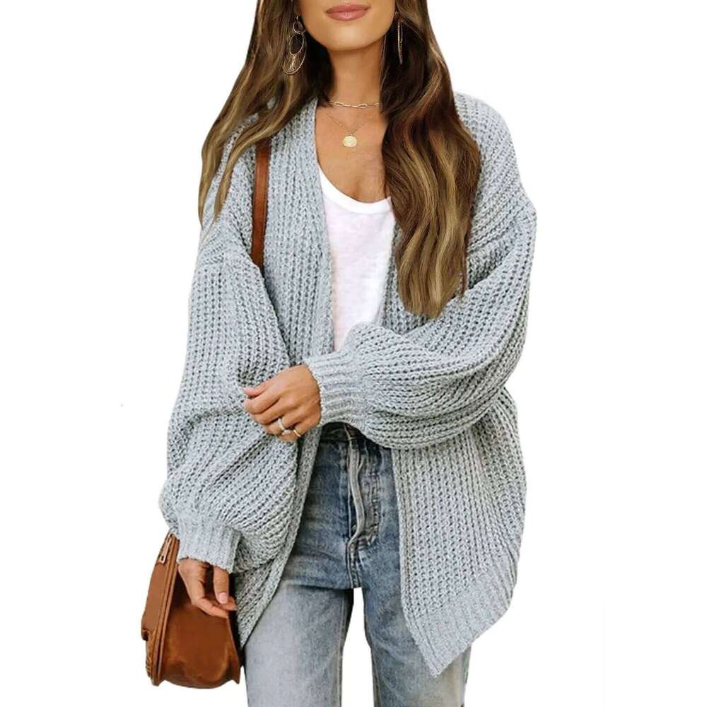 Women's lantern sleeve thick needle cardigan 2024 autumn and winter new item solid color pocket knitted sweater women's coat XJ260305