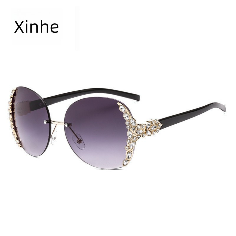 2026 New Designer Luxury Brand Fashion European And American Diamond Inlaid Elegant Fashion Sunglasses Metal Frameless Pointed Sunglasses Women's