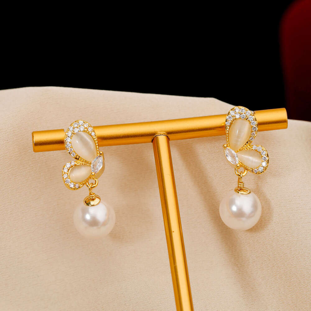 Cat's Eye Butterfly Pearl Earrings Silver Needle Women High-end Micro-inlaid Studs