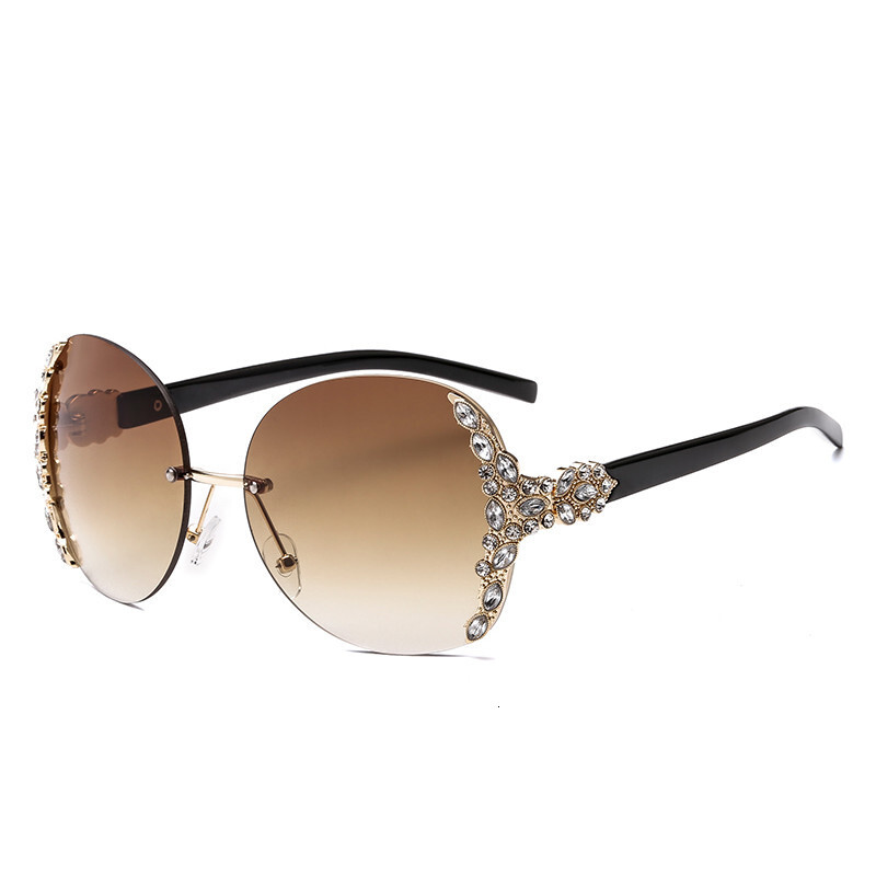 2026 New Designer Luxury Brand Fashion European And American Diamond Inlaid Elegant Fashion Sunglasses Metal Frameless Pointed Sunglasses Women's