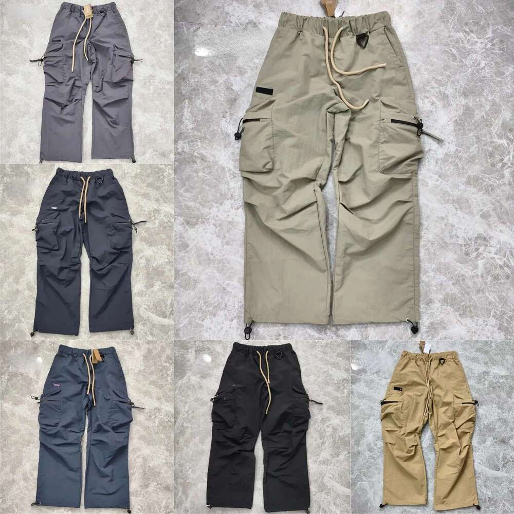 Men's Designer Luxury High Quality Waterproof Breathable Outdoor Windbreaker Pants Spring And Autumn Casual Trousers H260305