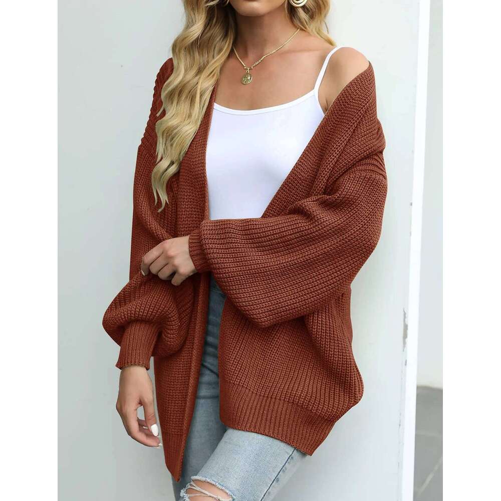 Women's lantern sleeve thick needle cardigan 2024 autumn and winter new item solid color pocket knitted sweater women's coat XJ260305