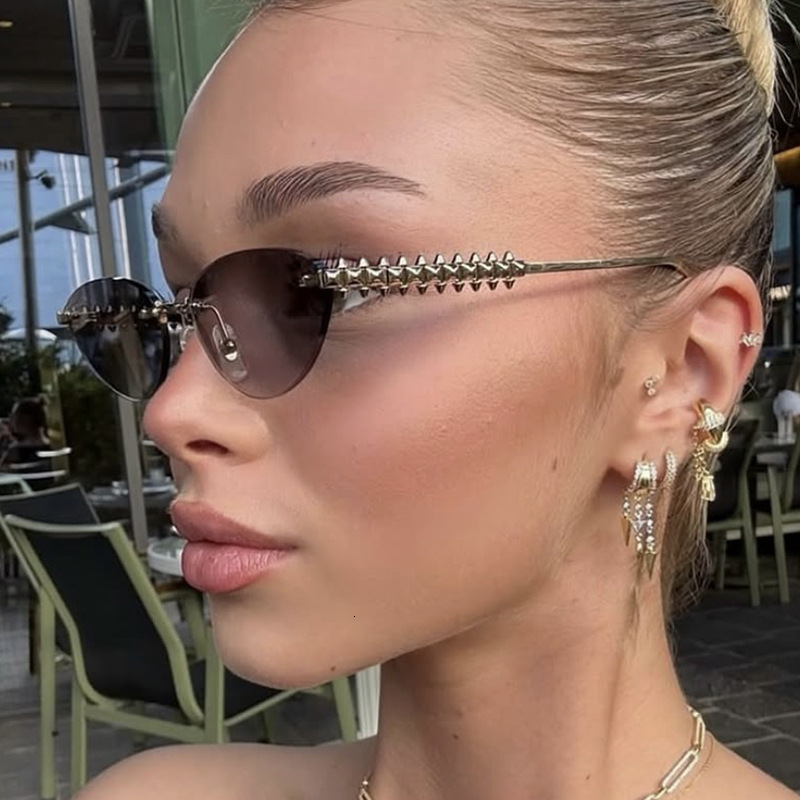 2026 New Designer Luxury Brand Nail Triangle Cat Eye Sunglasses Frameless Cutting Edge European And American Fashion High-end Sunglasses Sunshade Sung
