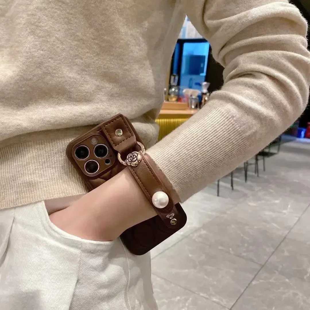 Luxury Quilted Phone Case with Camellia Pearl Wrist Strap For iPhone 15 14 Pro Max 13 Pro 12 11 | Full Protection CoverT260305