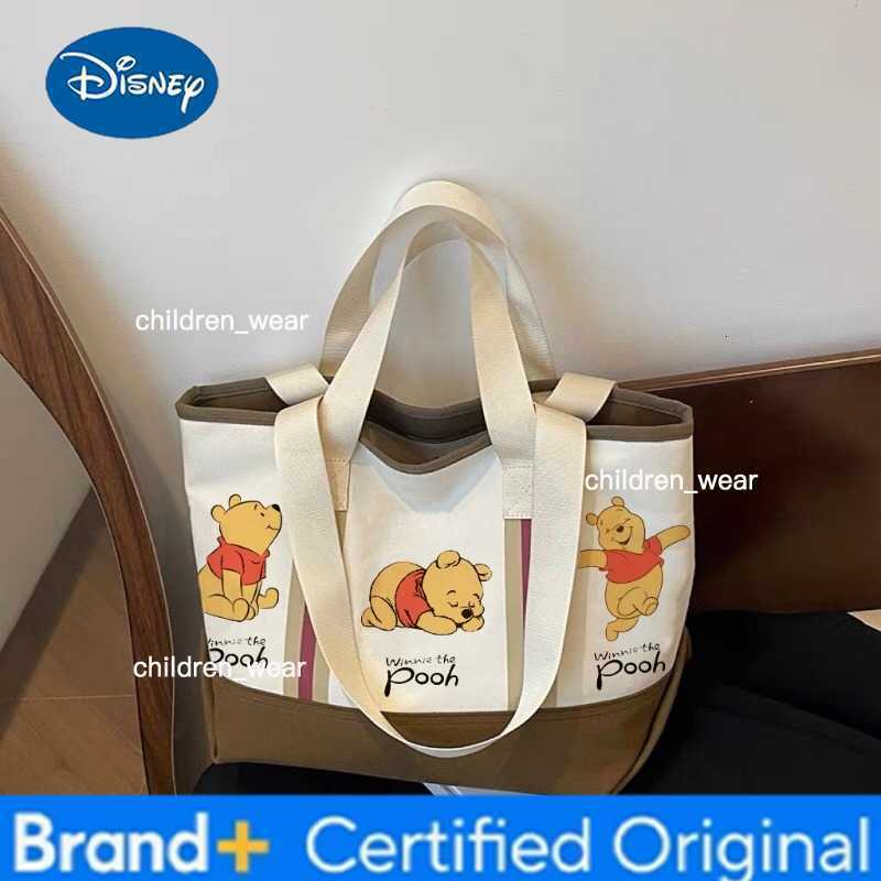 Disney 2026 New Winnie The Pooh Tote Bag For Women Fashion Canvas Shoulder Bag Ladies Casual Large Capacity Handbag H260305