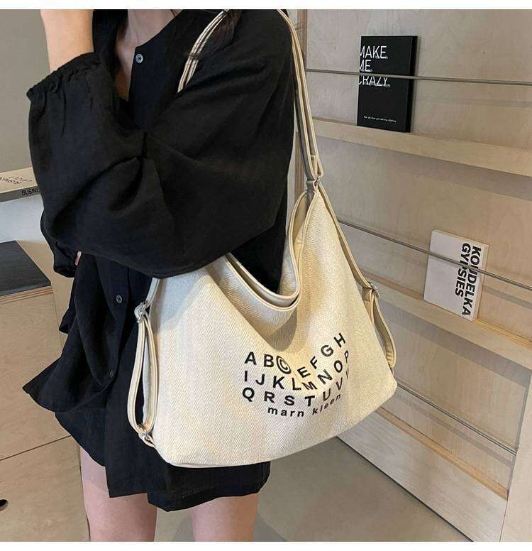 Korean Style Casual Letter Printed Large Capacity Canvas Bag New Unique Tote With Minimalist That Can Also Be Used As A Backpack XIU LAI SI