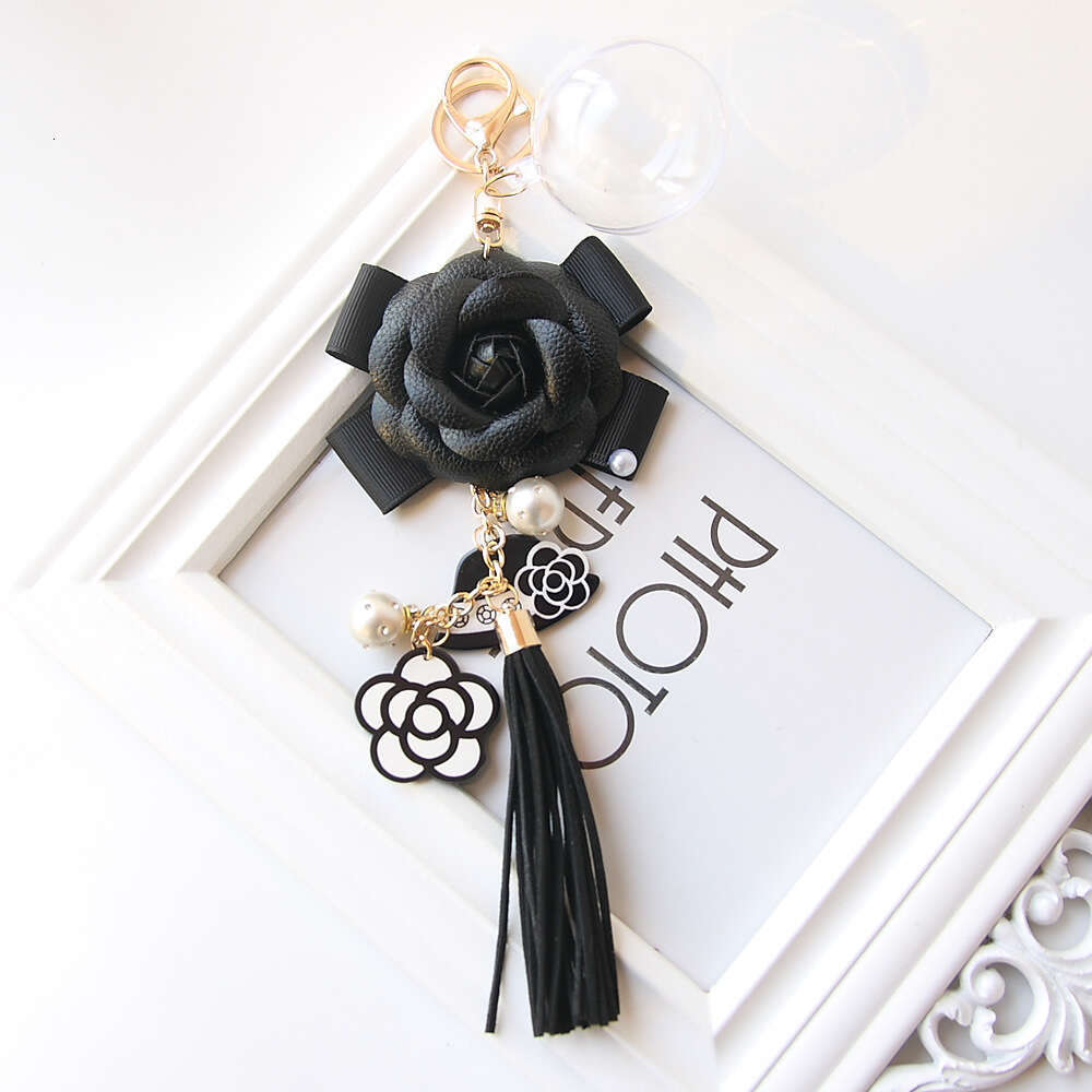 Hepburn-style camellia tassel pearl eternal flower keychain, bag charm, exquisite handmade floral gift