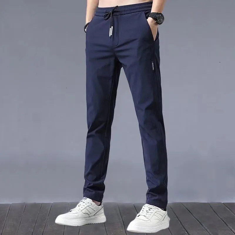 summer slim Korean version plus size trendy straight tube light business ice silk casual pants for men slim fit pants 260306