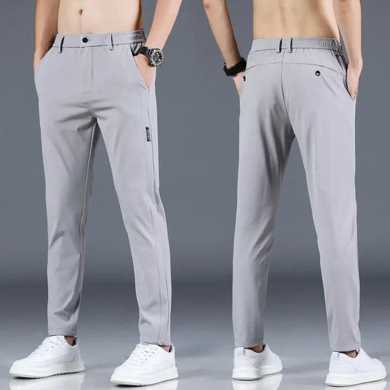 Ice silk mens pants summer black gray thin business casual pants outdoor elastic breathable straight leg sports pants 260306