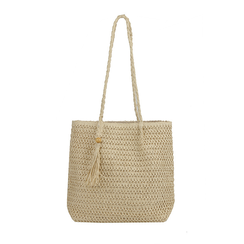 Beach vacation style women's large bag new hollow straw tote bag spring and summer large capacity armpit beach bag designer bag