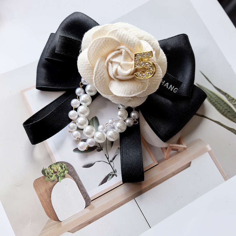 2025 New Camellia Bowknot Fashion Versatile Bow Tie Flower Pearl Brooch